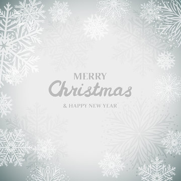 White snowflakes on gray background. Merry Christmas Greetings card