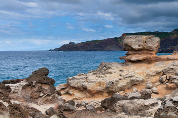 Boulder on a cliff overlooking the ocean, Maui, Hawaii, USA
