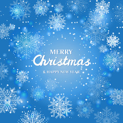 White snowflakes on blue background.  Merry Christmas Greetings card