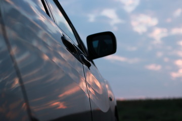 Sky reflecting on Car