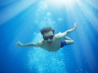 Man flying in the sea
