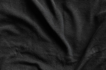 Black fleece, texture of soft insulating fabric © evannovostro