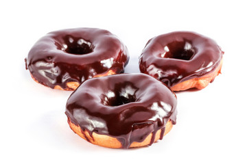 Donuts in chocolate glaze isolated on white background