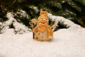 A snowman standing in the snow