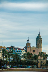 Naklejka premium Spanish Beach Resort in Barcelona, Spain. Sitges area is known as a beach resort town.