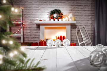 Table background with free space and fireplace decoration 
