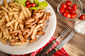 Greek gyros dis with fries and salad