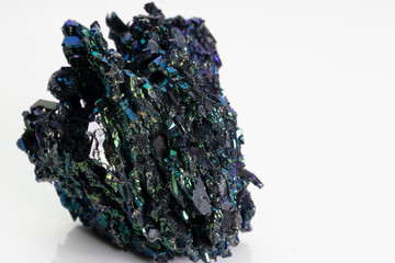 Silicon carbide (carborundum),  shiny and colorful mineral stone from Vesuvius volcano isolated on a white background, Naples, Italy
