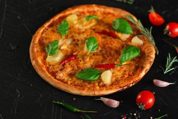 pizza, pineapples, chicken, tomato sauce, vegetables, basil (pizza ingredients). food background. copy space