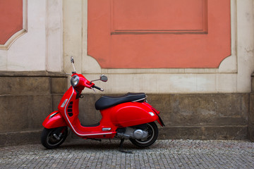 Vintage scooter on the old europe streets © serejkakovalev