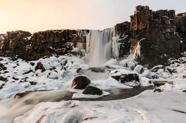 Sunset at Oxararfoss (Öxarárfoss), a waterfall in Thingvellir (Þingvellir) National Park, Iceland