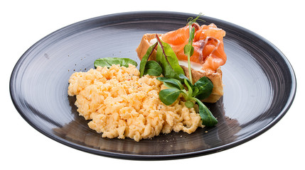 Breakfast. Scrambled eggs with salmon