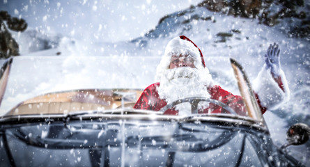 Santa Claus car and winter road 