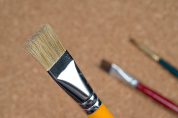 detail of brush bristles on cork background