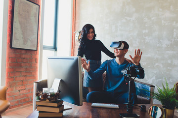 People shooting on special camera wearing vr headset. video producer, creation of virtual content, computer, glasses.