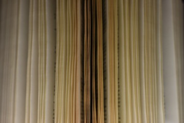 closeup opening book black background