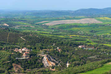 Fototapeta na wymiar Amazing aerial view of Bagno Vignoni from Fortress of Tentennano, Tuscany, Italy