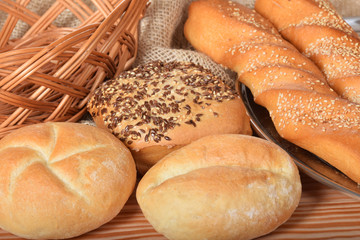 various fresh crispy baked buns with seeds