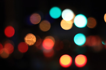 Defocused car lights in the evening traffic jam