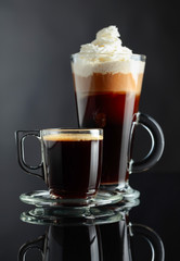 Various coffee drinks on a black background.