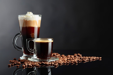 Various coffee drinks on a black background.