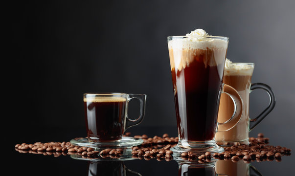 Various coffee drinks on a black background.
