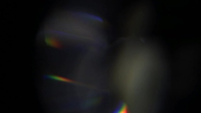 Long bright, colorful, spectral glass overlay light leaks