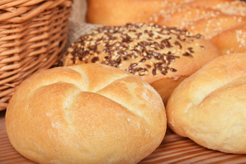 various fresh crispy baked buns with seeds