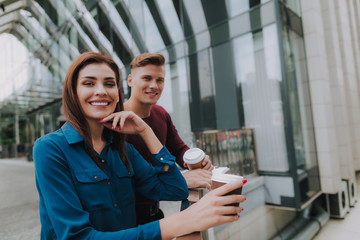 Young male and female friendly coffee break
