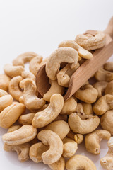cashew nuts on a white acrylic background