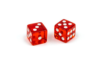 Two red glass dice isolated on white background. Three and five.