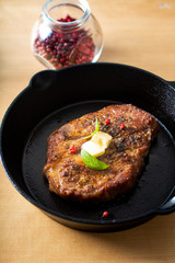 Food concept grilled Marinat Sirloin meat steak in Cast-Iron Skillet pan with copy space