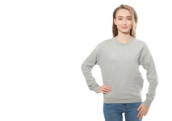 Obraz premium young girl in gray sweatshirt, gray hoodies. white background