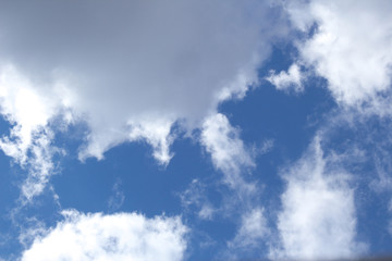 white clouds on blue sky background image