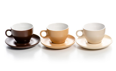 Set of coffee cups with saucers on a white background. Isolation