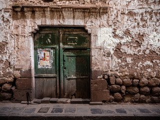 Vintage abandoned door in Cuzco Peru