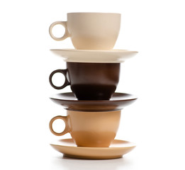Set of coffee cups with saucers on a white background. Isolation