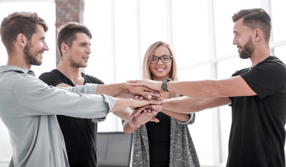 Business people teamwork stacking hands