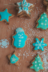 christmas gingerbread cookies on wooden background