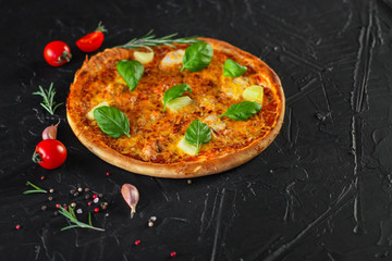 pizza, pineapples, chicken, tomato sauce, vegetables, basil (pizza ingredients). food background. copy space