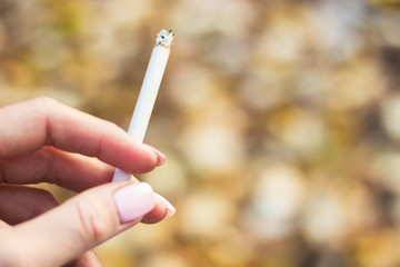 Young woman enjoying a cigarette