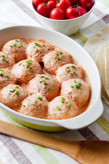 Chacken meatballs baked in creamy tomato sauce