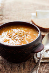 Kapustnyak - traditional ukrainian winter soup with sauerkraut, millet and meat
