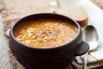 Kapustnyak - traditional ukrainian winter soup with sauerkraut, millet and meat