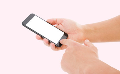 hand hol black phone isolated on pink background, blank screen