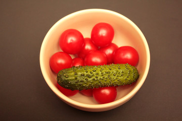 tomatoes and cucumbers on a plate