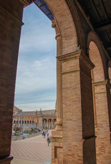 Fototapeta premium Sevilla, Spain - October, 2018: Spanish Square Plaza de Espana in Sevilla in a beautiful autumn day