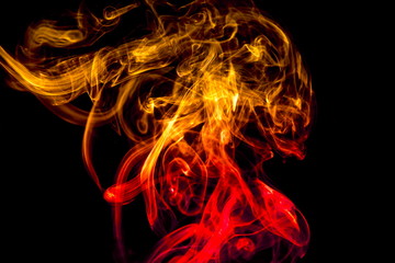 Obraz premium Colored smoke on black background