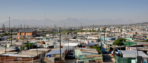 Panorama of Khayalitsha Township - the poorest slums - against the background of mauntains in...