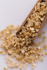 fragrant dried parsnip on a white acrylic background